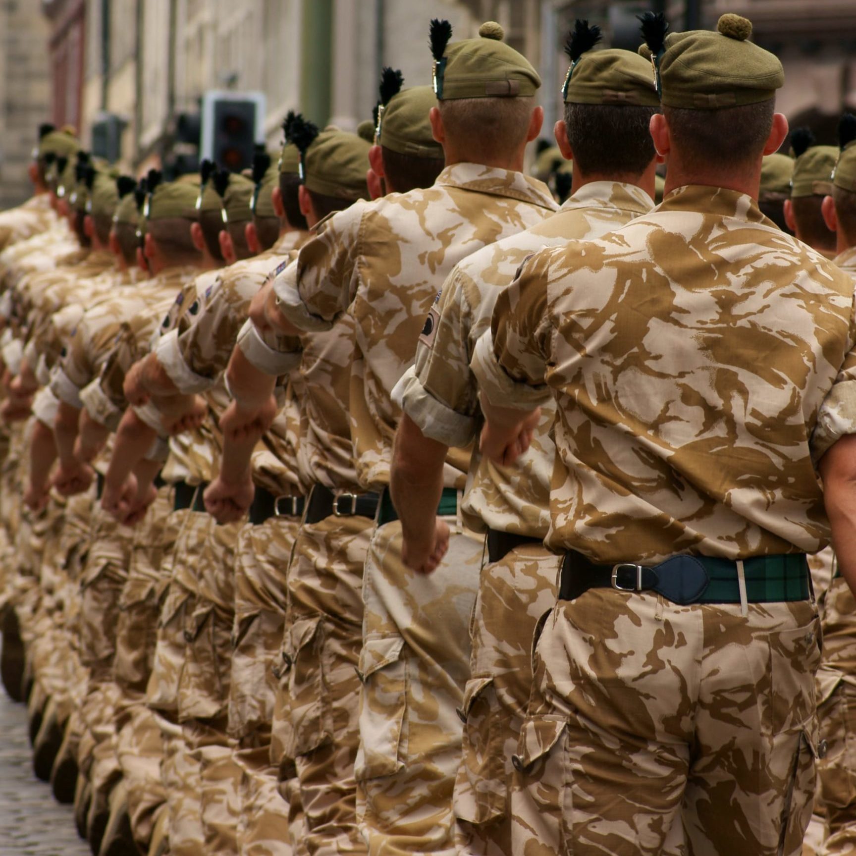 Group of military men marching